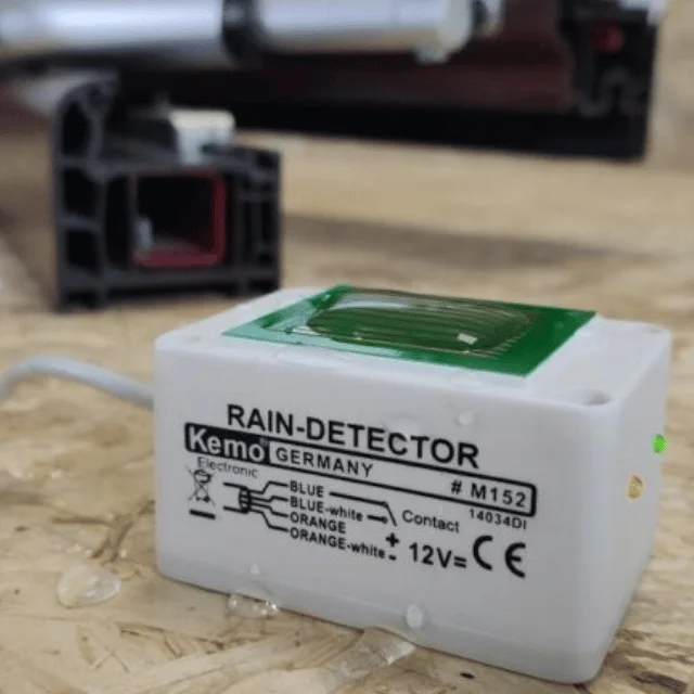 Actuator opened window with rain sensor